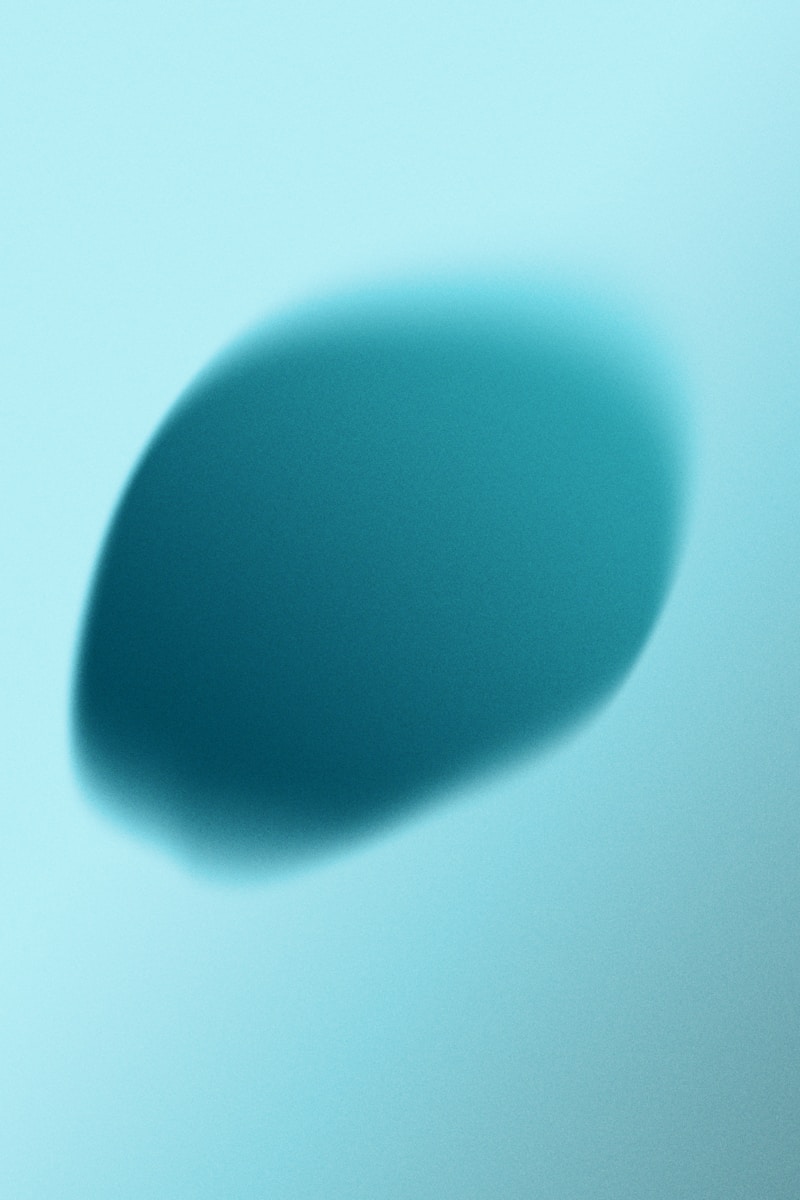 Photo by Martin Martz Abstract teal oval shape on light blue background