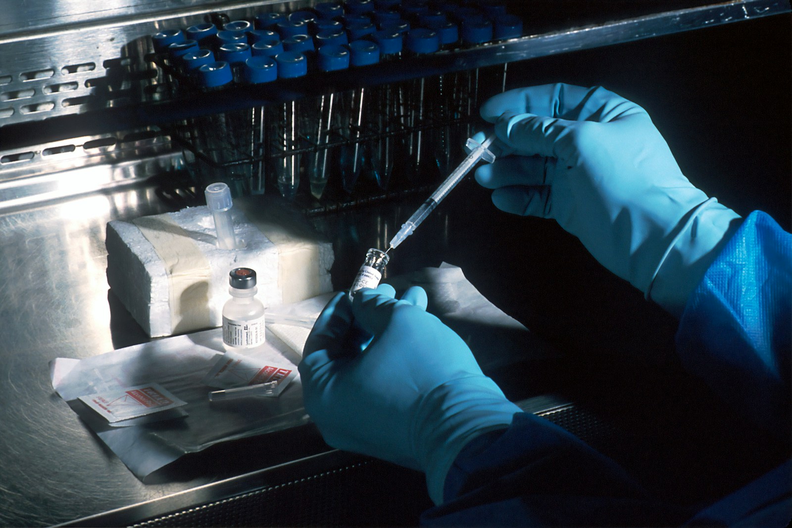 Photo by National Cancer Institute person holding silver and black hand tool