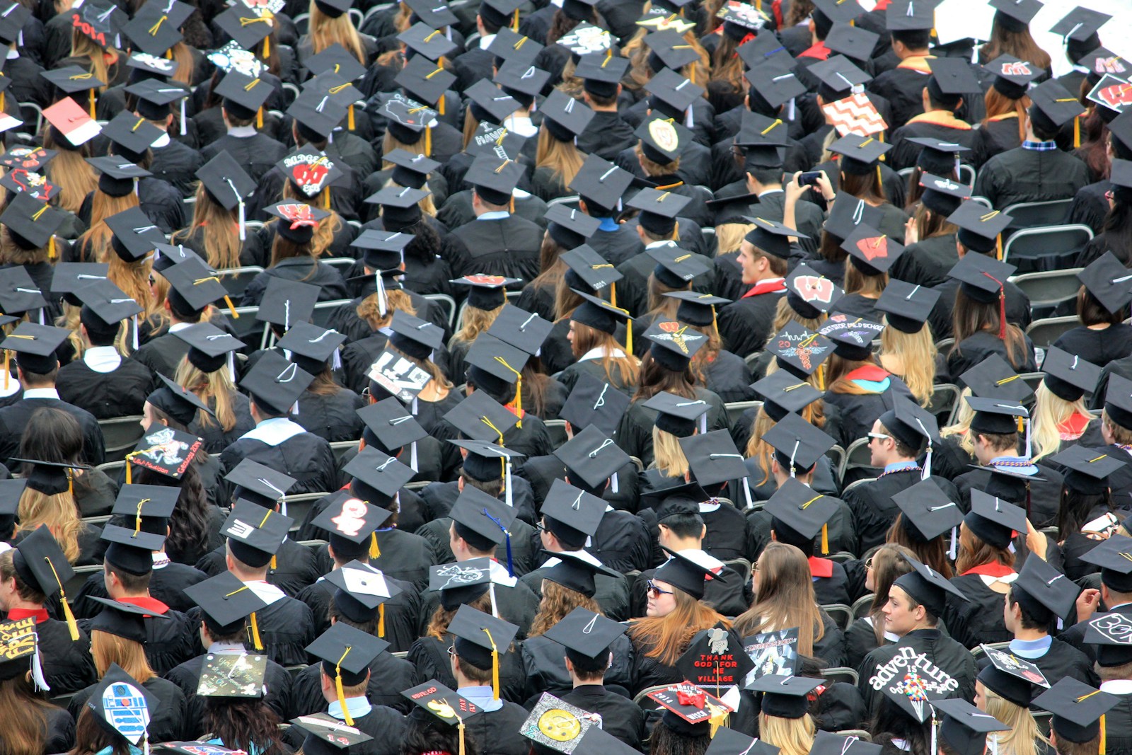 Photo by Good Free Photos aerial view of graduates wearing hats